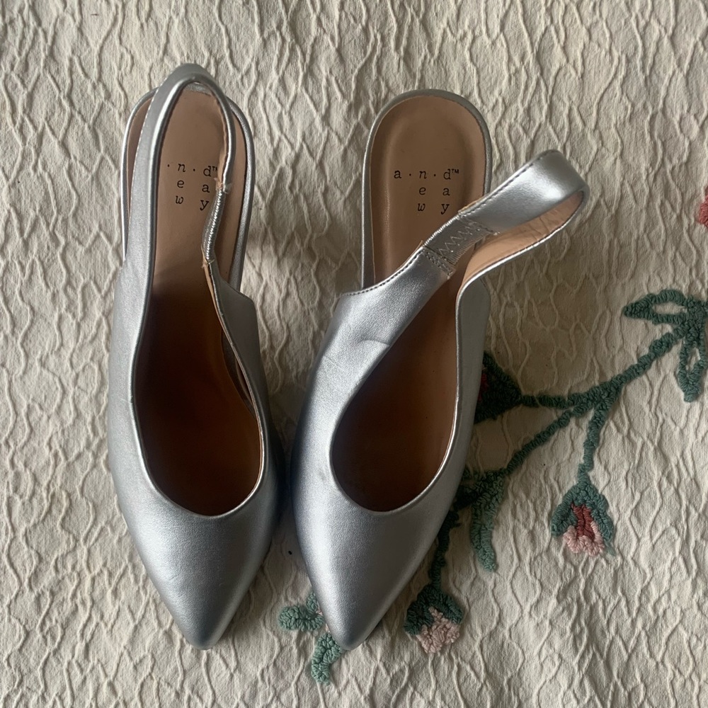 Metallic silver slingback heel